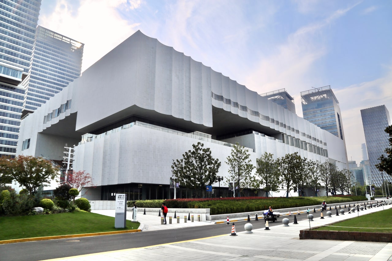 The curved facade and entrance plaza of Shanghai Museum East